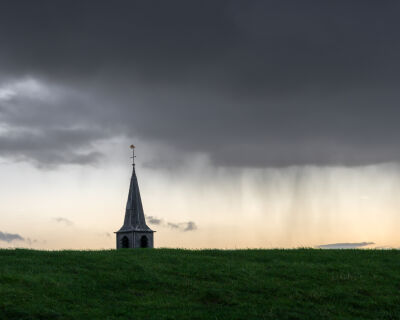 The church of Paesens in Friesland on a rainy afternoon