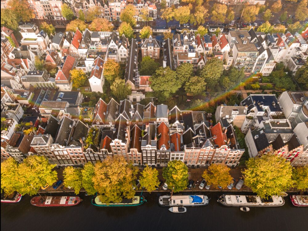 Autumn colors in Amsterdam with a rainbow