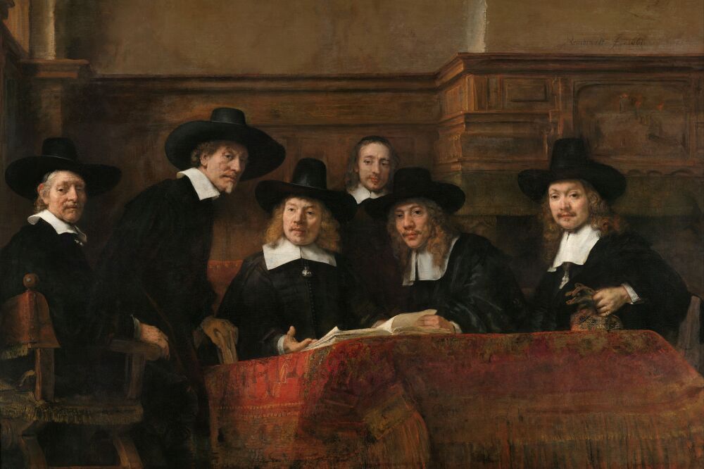 De Staalmeesters (De waardijns van het Amsterdamse lakenbereidersgilde) - Rembrandt van Rijn uit 1662