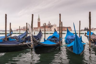 Venice and its gondolas on a rainy afternoon
