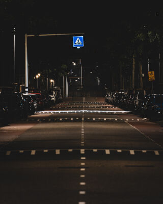 Endless Street With Illuminated Zebra Crossing